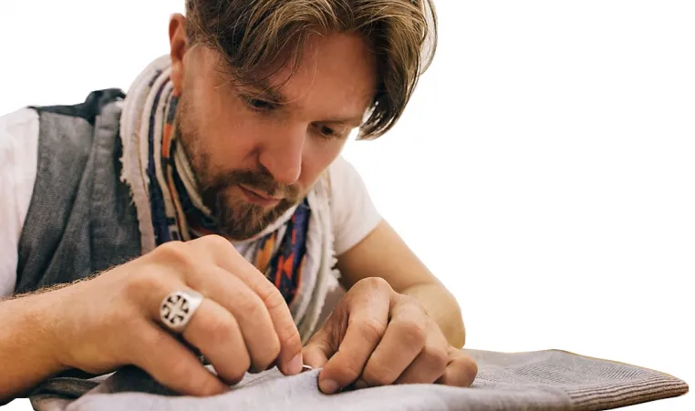 Man Sewing